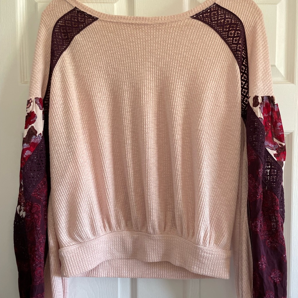 Free people top…loose sleeved with elastic cuffs.